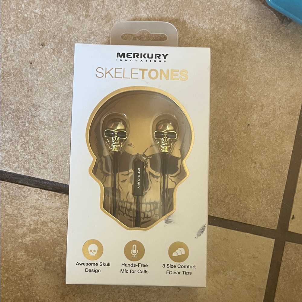 Merkury Innovations Skeletones Gold Earbud Headphones